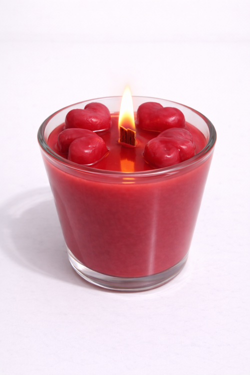 Vela aromática de frutas Vertical Essence’s en vaso de cristal, cera vegetal artesanal con colores frutales, aroma dulce y fresco, diseño elegante y natural para ambientación.