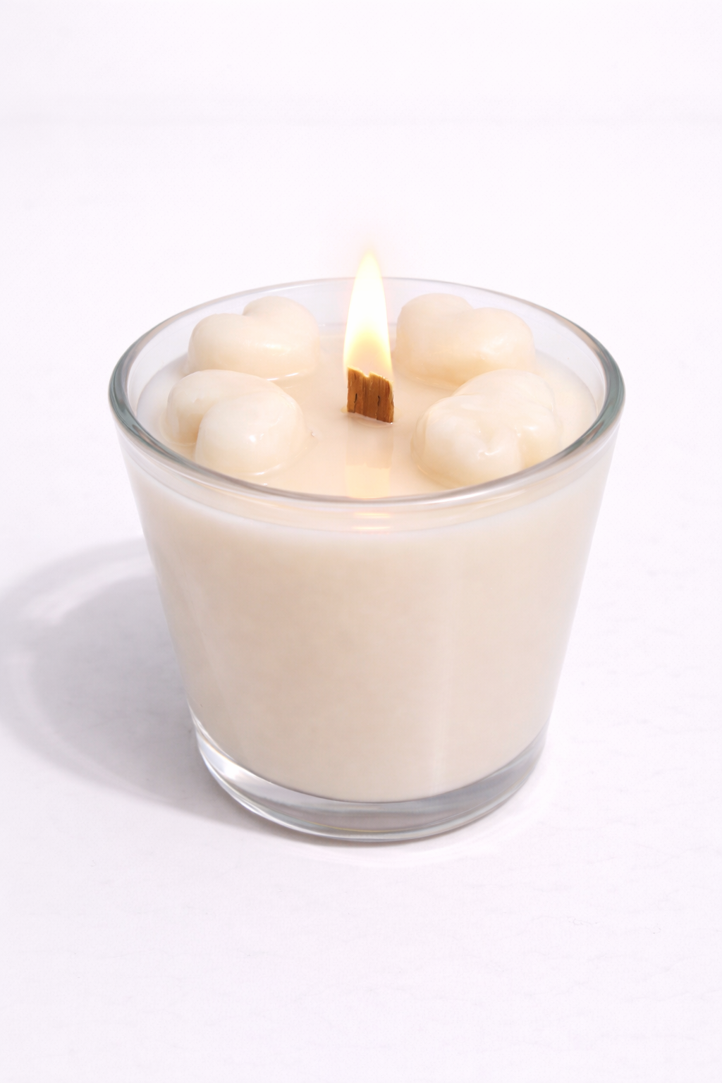 Vela aromática de frutas Vertical Essence’s en vaso de cristal, cera vegetal artesanal con colores frutales, aroma dulce y fresco, diseño elegante y natural para ambientación.